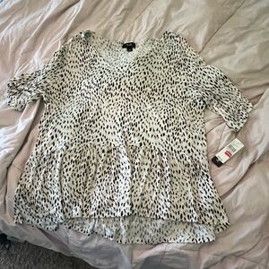 AGN peplum top. Animal print.  Light weight.  Flowy.  Sz. XL NWT
